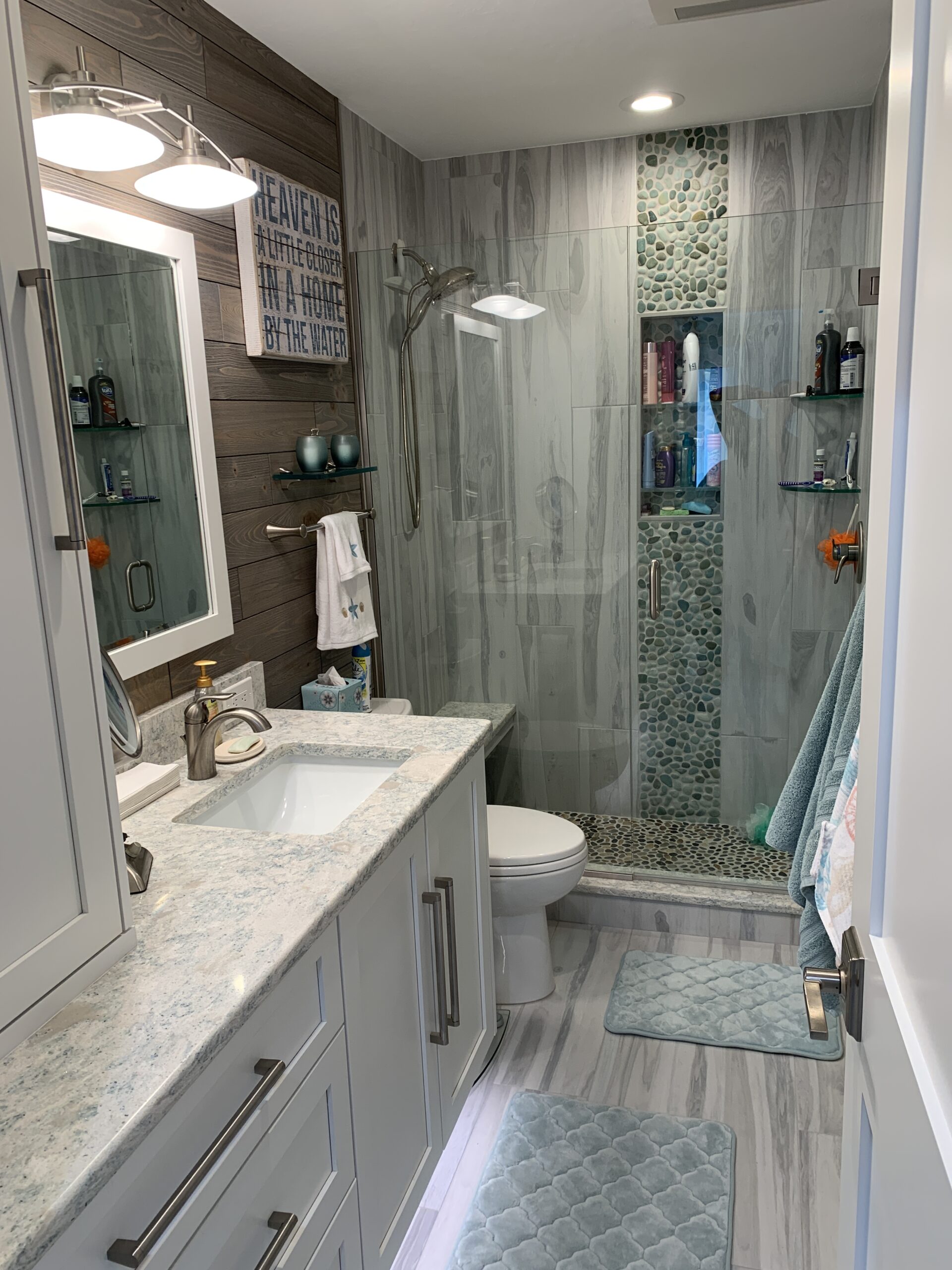 Boca Grande condo renovation with modern kitchen, sound-reducing floors, and bright coastal finishes